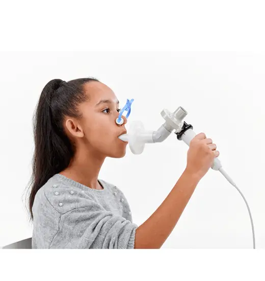 Another patient breathing into Vyaire's Vyntus SPIRO PC Spirometer pulmonary function testing device.