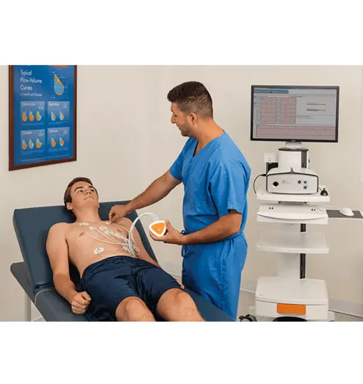 Clinician preparing to test a patient using the Vyntus 12-lead ECG device.